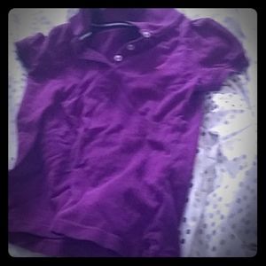 A purple polo